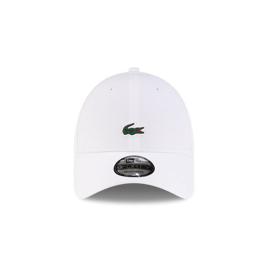 Front view of New Era x Lacoste 9FORTY Core White Adjustable Cap highlighting the centered crocodile logo