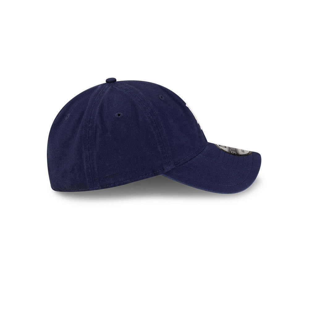 Right side profile view of New Era x Ralph Lauren Dodgers 9TWENTY Navy Cap showing pre-curved visor.