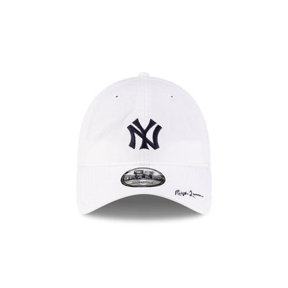 Front view of New Era x Ralph Lauren Yankees 9TWENTY White Cap highlighting the Ralph Lauren script on visor