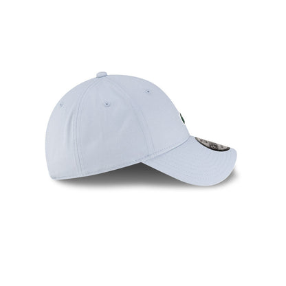 Right side profile view of New Era x Lacoste 9FORTY Core Light Blue Adjustable Cap showing pre-curved visor.