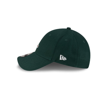 Left side profile view of New Era x Lacoste 9FORTY Core Dark Green Adjustable Cap featuring stitched white flag logo.