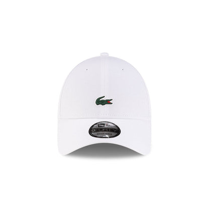 Front view of New Era x Lacoste 9FORTY Core White Adjustable Cap highlighting the centered crocodile logo