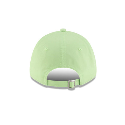 Rear view of New Era x Lacoste 9FORTY Women Core Pastel Green Adjustable Cap showcasing cloth strapback and metal closure.