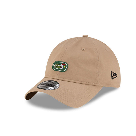 Front left view of New Era x Lacoste 9TWENTY Flag Beige Adjustable Cap highlighting the classic New Era flag logo.