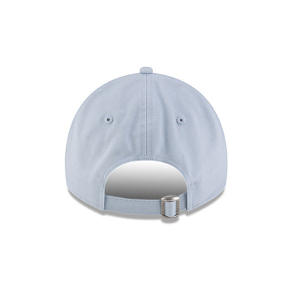 Back view of New Era x Lacoste 9TWENTY Golf Ball Pastel Blue Adjustable Cap showcasing cloth strapback and metal closure.