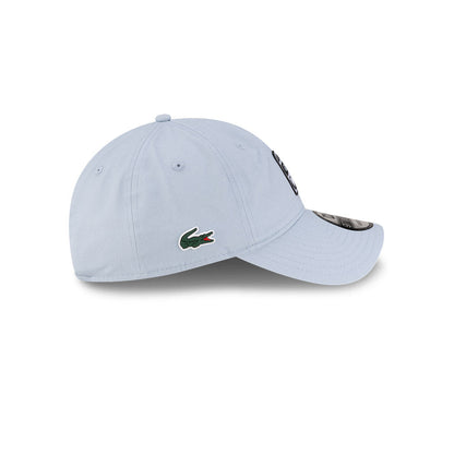Right side profile view of New Era x Lacoste 9TWENTY Golf Ball Pastel Blue Adjustable Cap showing pre-curved visor.