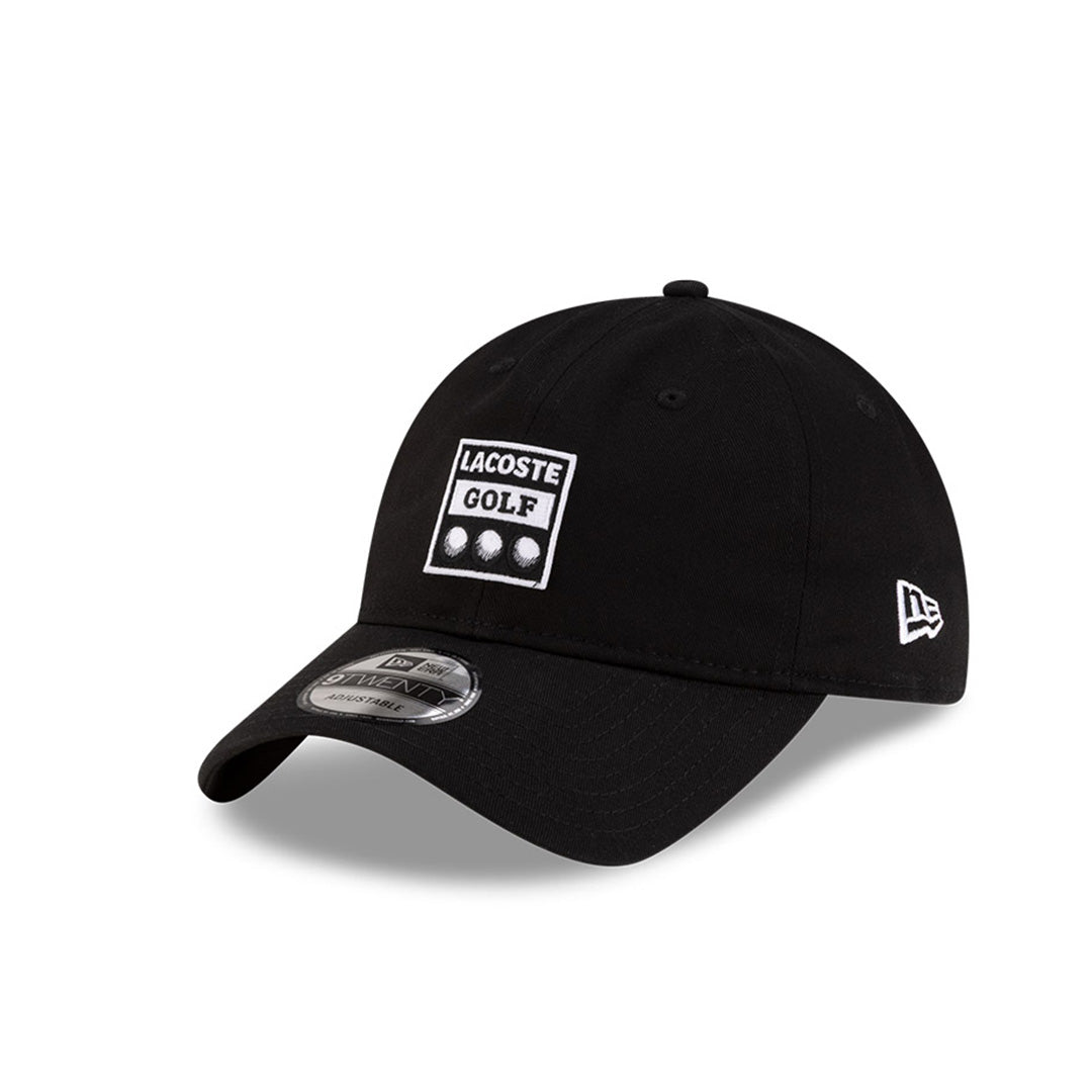 Front left view of New Era x Lacoste 9TWENTY Golf Ball Black Adjustable Cap displaying the relaxed unstructured crown.