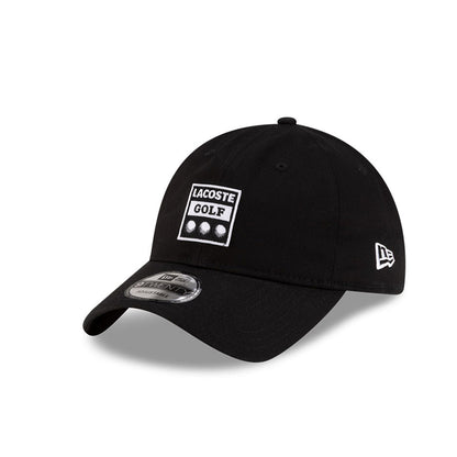 Front left view of New Era x Lacoste 9TWENTY Golf Ball Black Adjustable Cap displaying the relaxed unstructured crown.