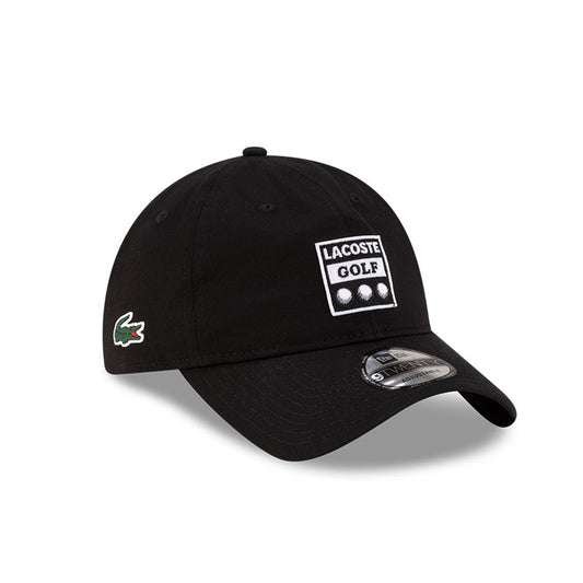Front right view of New Era x Lacoste 9TWENTY Golf Ball Black Adjustable Cap highlighting the side crocodile logo