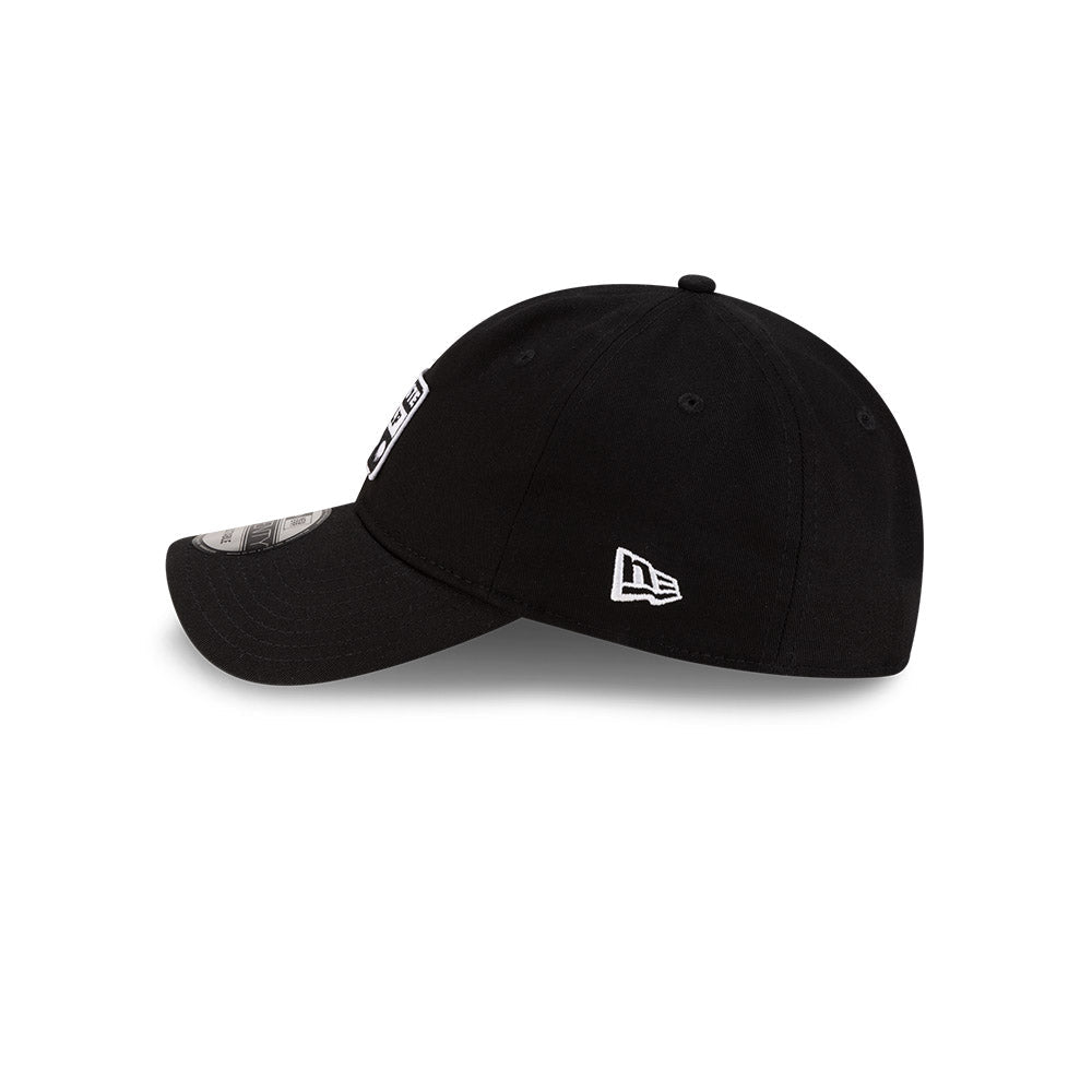 eft side profile view of New Era x Lacoste 9TWENTY Golf Ball Black Adjustable Cap featuring stitched New Era flag logo.