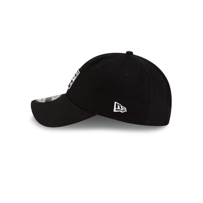 eft side profile view of New Era x Lacoste 9TWENTY Golf Ball Black Adjustable Cap featuring stitched New Era flag logo.